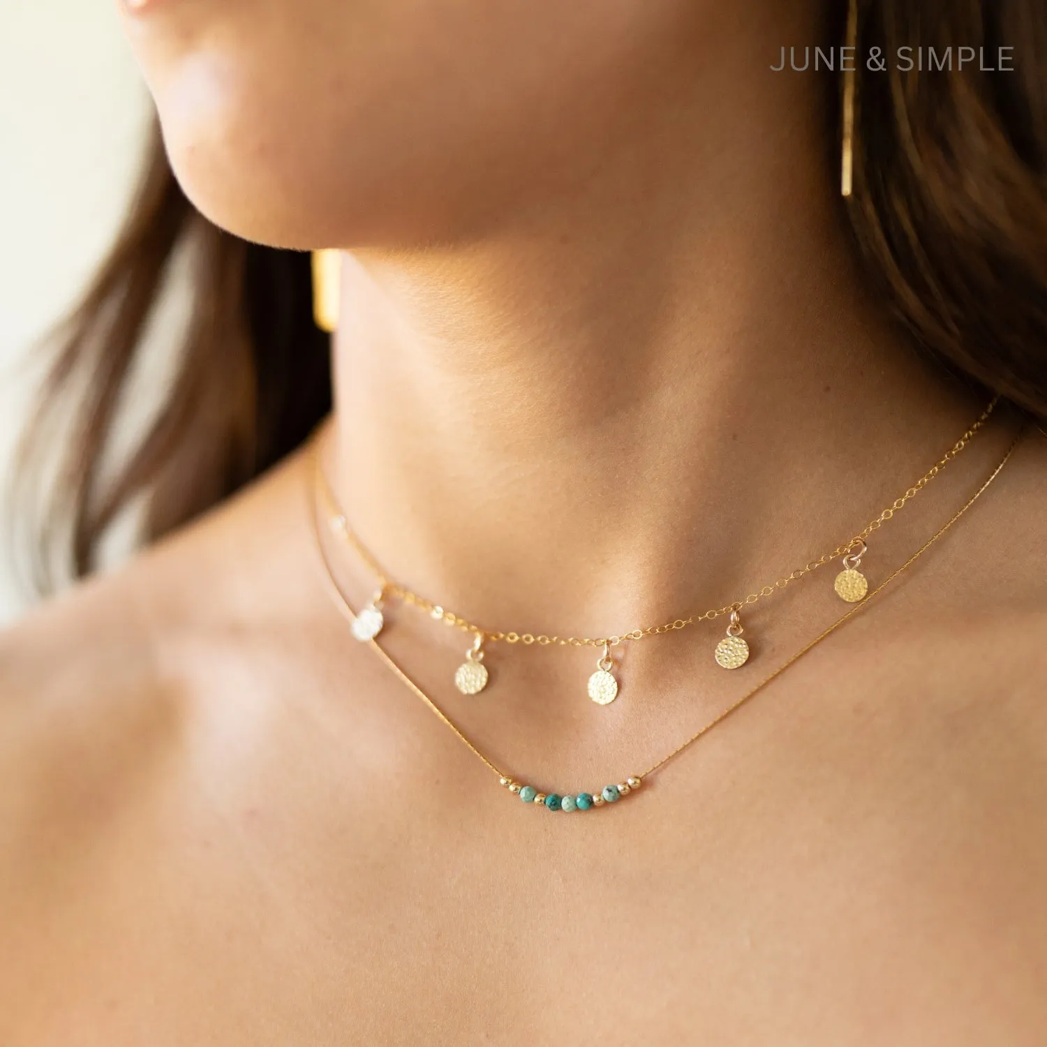 Five mini gold discs necklace