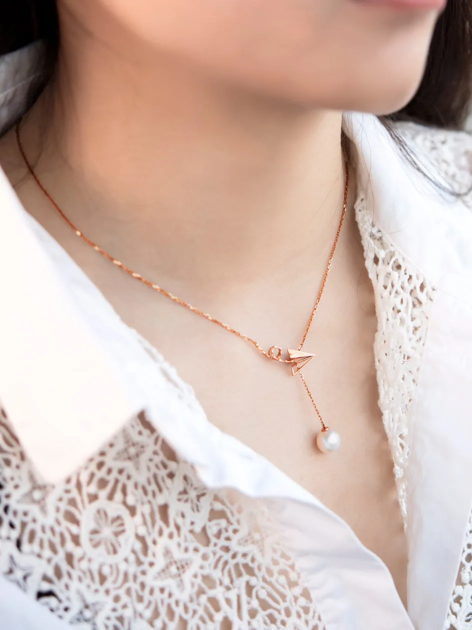 “Origaminx Airplane” 18K gold and Akoya pearl, origami-shaped necklace