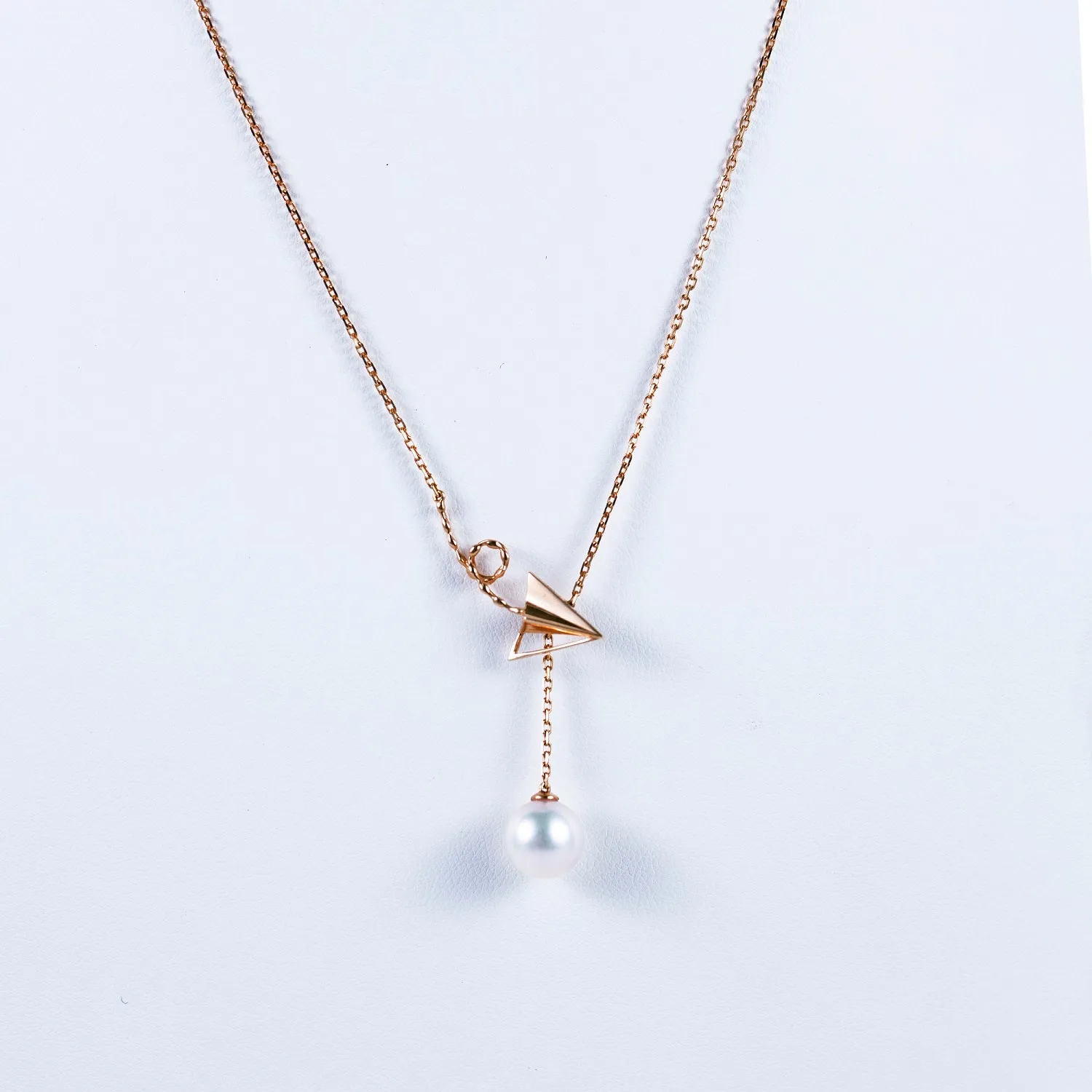 “Origaminx Airplane” 18K gold and Akoya pearl, origami-shaped necklace