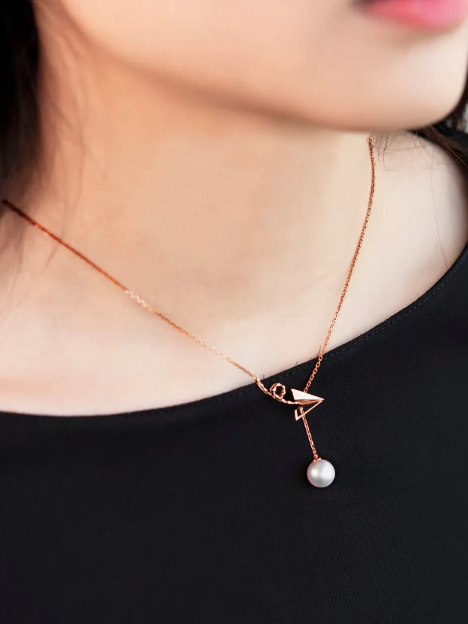 “Origaminx Airplane” 18K gold and Akoya pearl, origami-shaped necklace