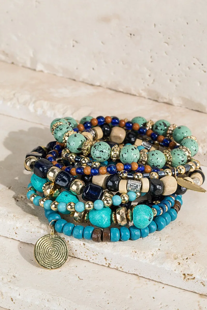 Seaside seed bracelet with charm accents *
