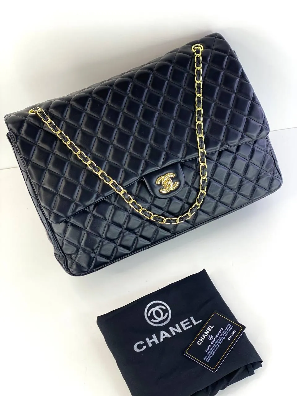 Title: Chanel Classic Quilted Flap Bag in Black with Gold Hardware