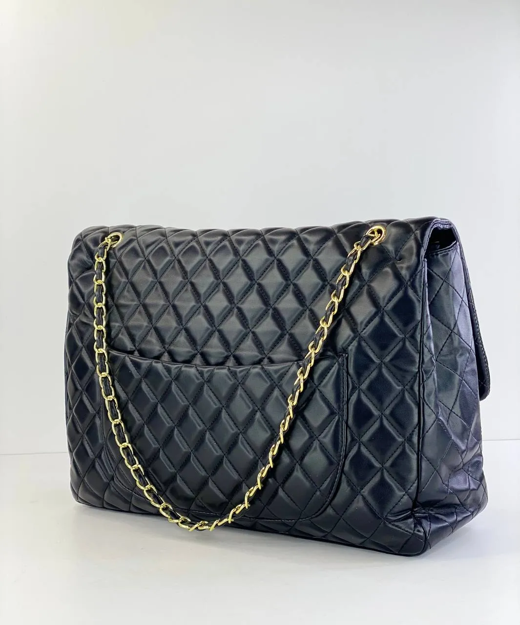 Title: Chanel Classic Quilted Flap Bag in Black with Gold Hardware