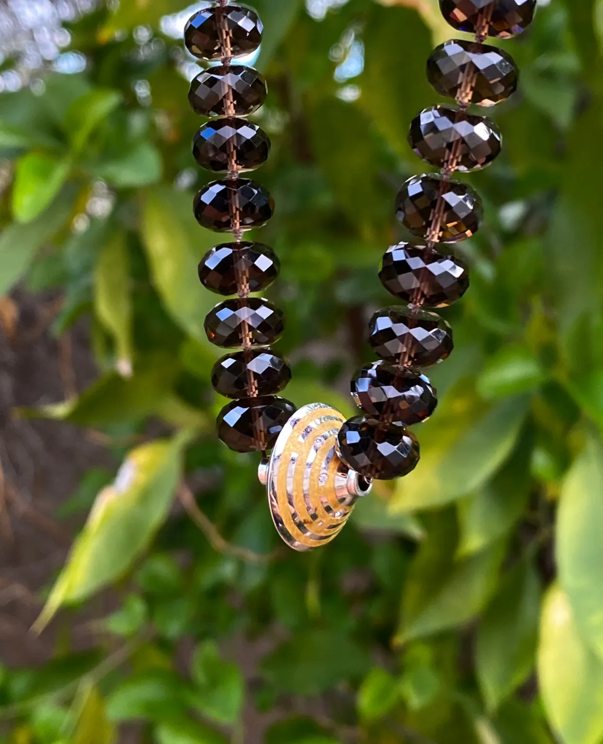 Trantor Bead on Smoky Quarts Beads