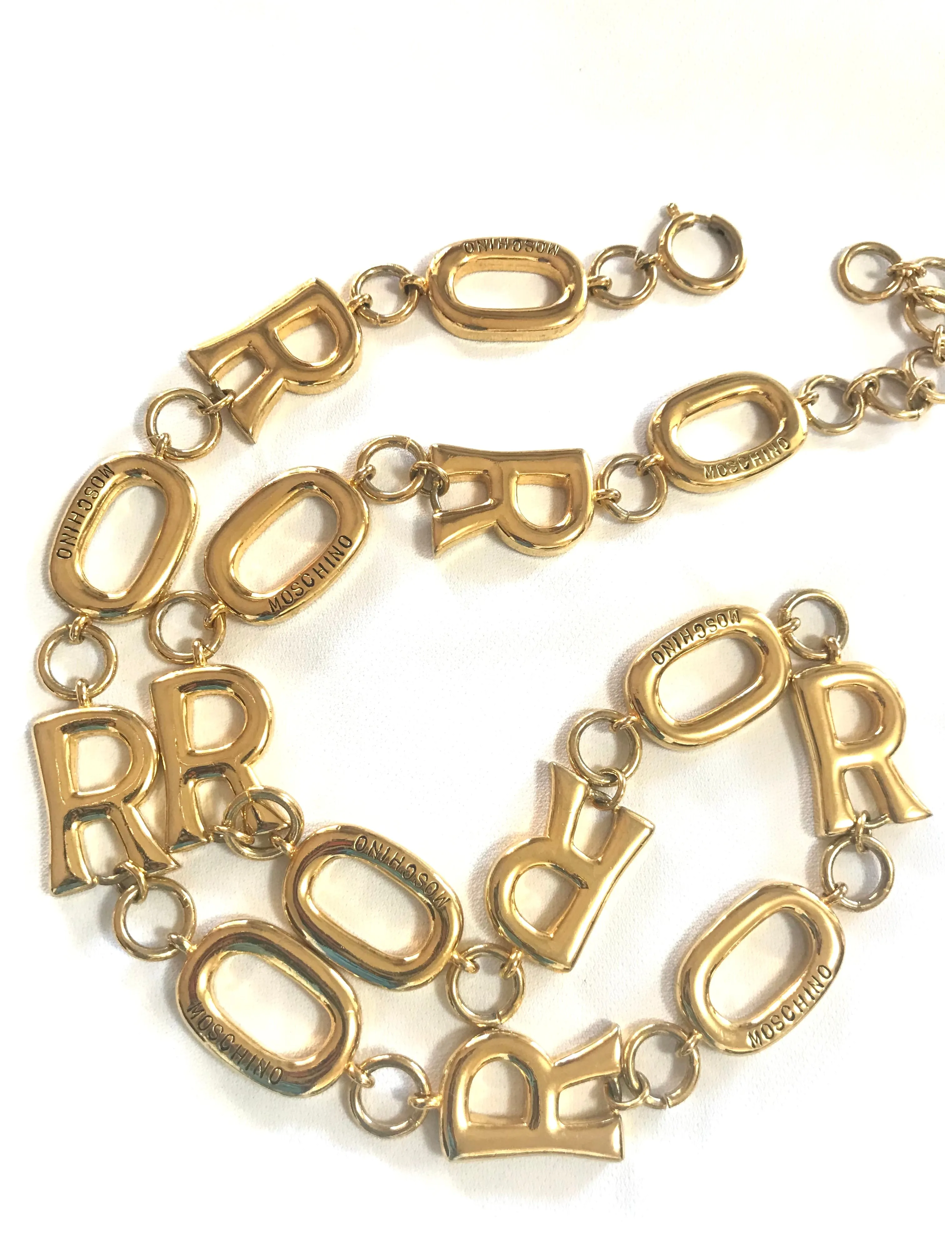 Vintage Moschino chain statement necklace with golden O and R letter charms with logos. 050323re5