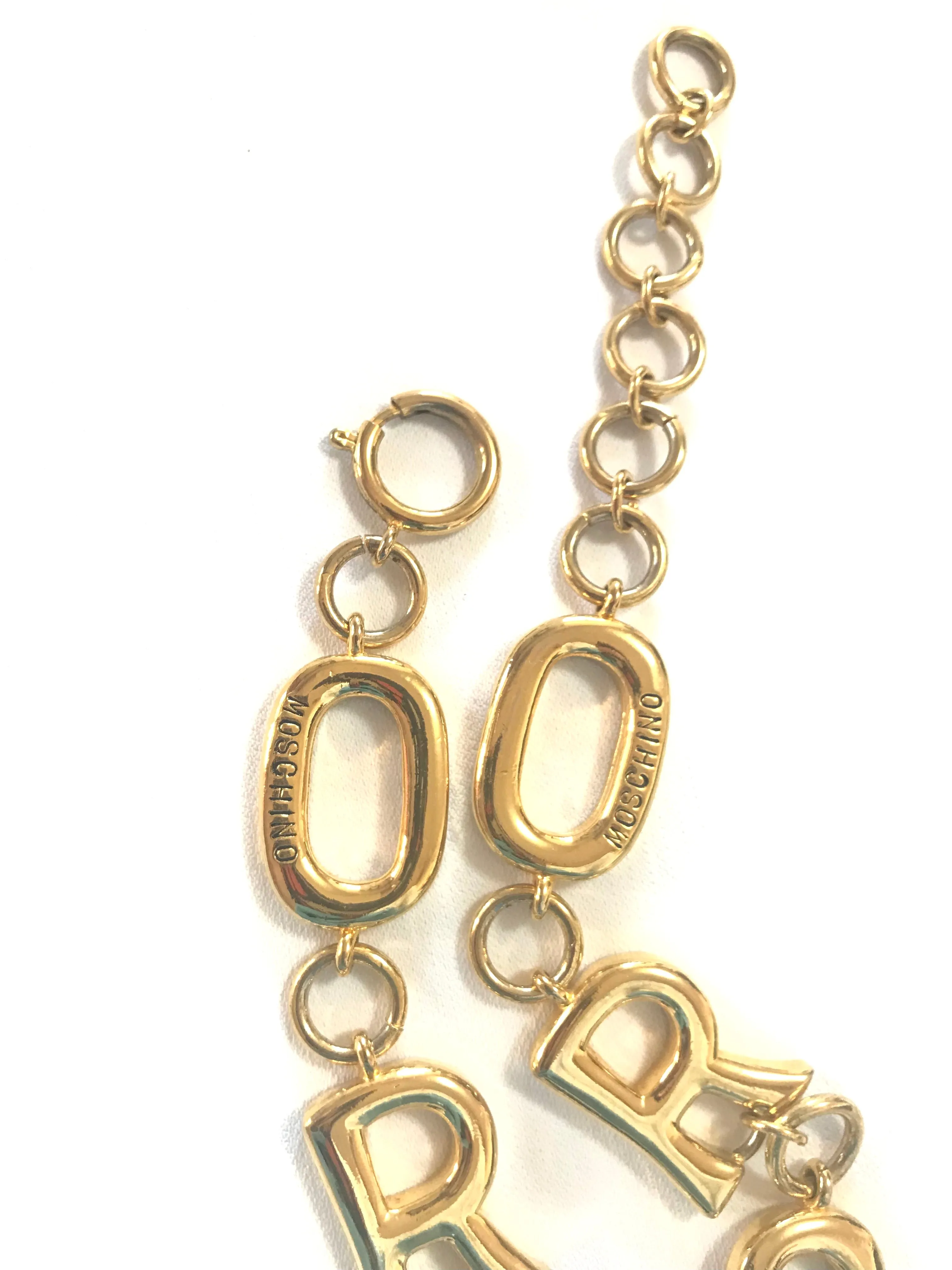 Vintage Moschino chain statement necklace with golden O and R letter charms with logos. 050323re5